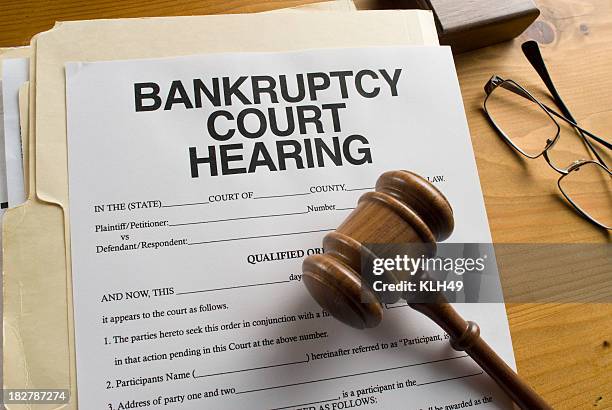 bankruptcy court hearing paperwork - bankruptcy law stock pictures, royalty-free photos & images