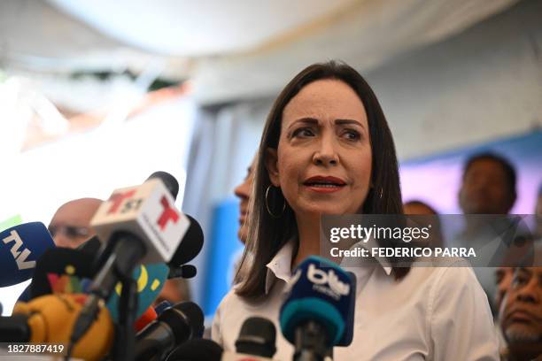 Venezuelan opposition leader, Maria Corina Machado, speaks during a press conference at her party headquarters in Caracas on December 6, 2023. Former...