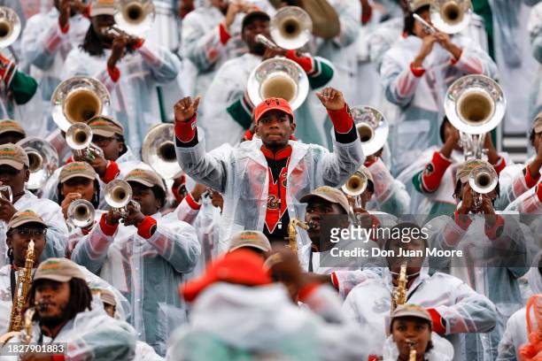 Members of the Florida A&M Rattlers Marching 100 Band performs in the stands during the SWAC Conference Championship game against the Prairie View...