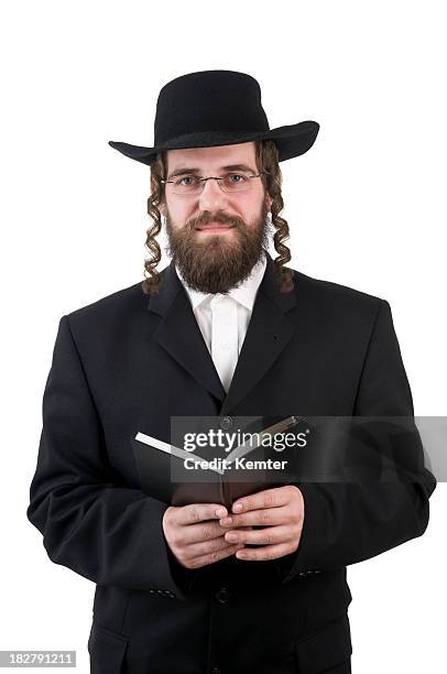 rabbi hält ein buch - judaism stock-fotos und bilder