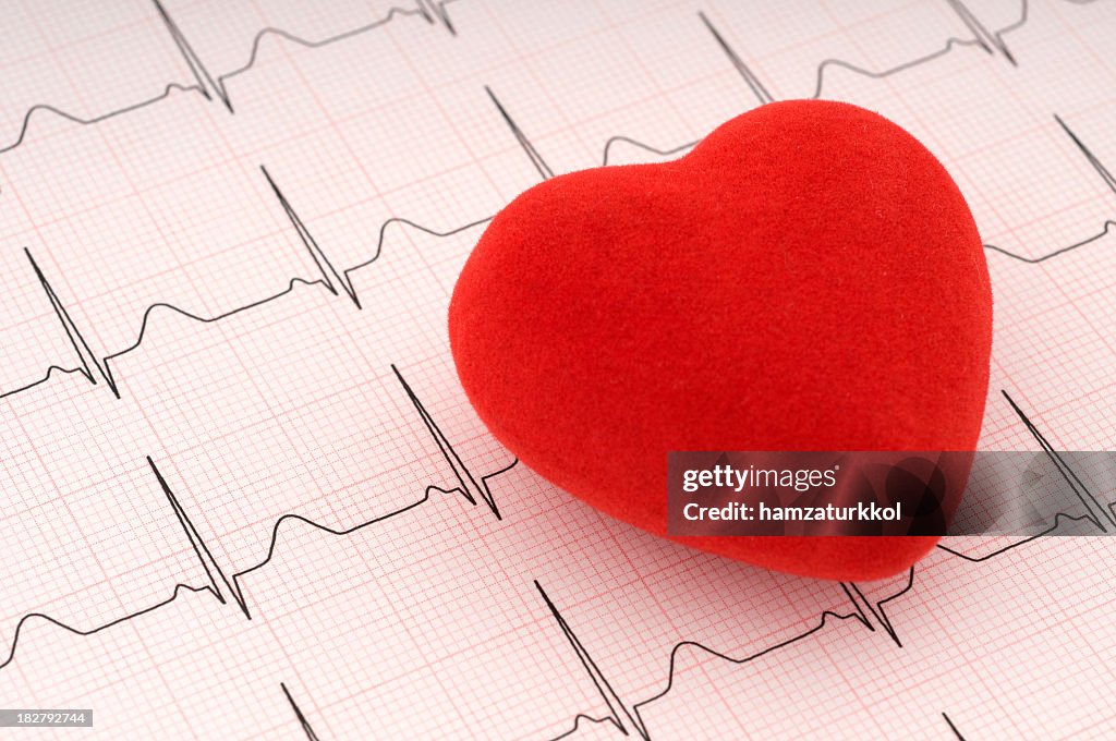 Red felt heart on ECG printout