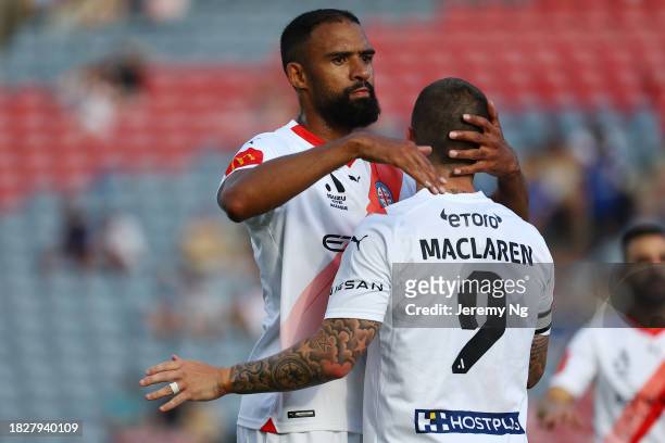 Jaime Maclaren of Melbourne City celebrates scoring a goal with this teammates during the A-League Men round six match between Newcastle Jets and...