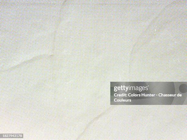 colored dots printed on white paper in paris, france - graphischer druck stock-fotos und bilder