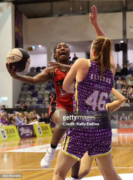 Aari McDonald of the Lynx drives to the basket during the WNBL match between Melbourne Boomers and Perth Lynx at Melbourne Sports Centres -...