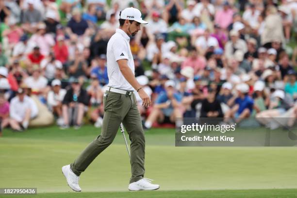 Joaquin Niemann of Chile reacts after putting on the 18th green during playoffs against Rikuya Hoshino of Japan in the ISPS HANDA Australian Open at...