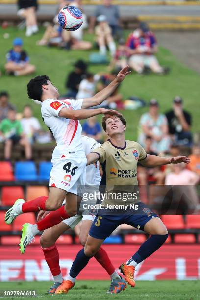 Lucas Mauragis of the Jets and Ben Mazzeo of Melbourne City contest for the ball during the A-League Men round six match between Newcastle Jets and...