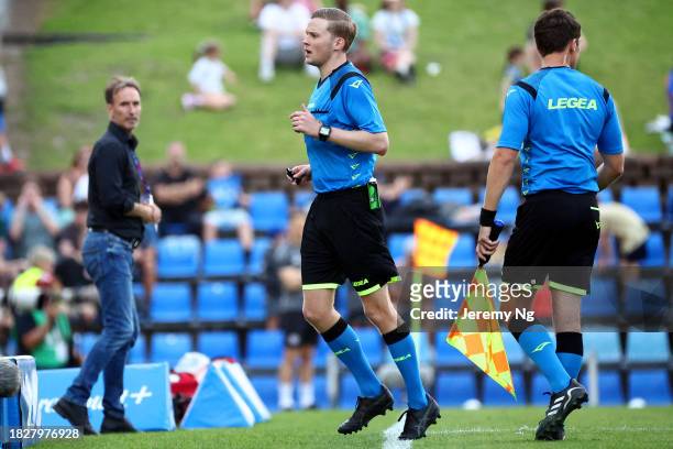 Referee Shane Skinner runs to the VAR for a review during the A-League Men round six match between Newcastle Jets and Melbourne City at McDonald...