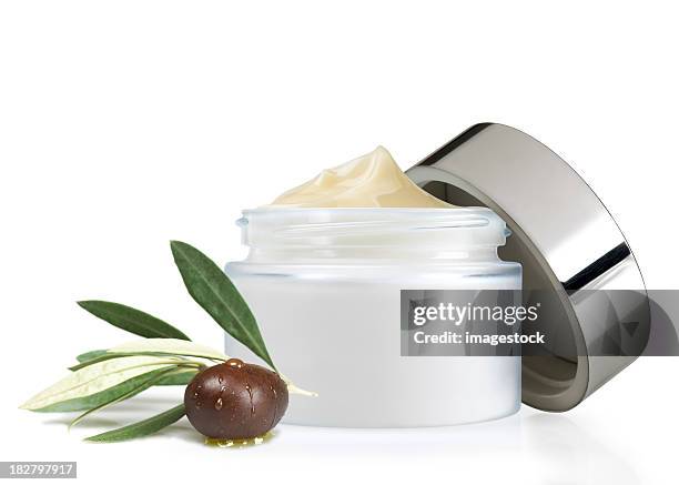 a fresh new open olive oil face cream - antioxidant cream stock pictures, royalty-free photos & images