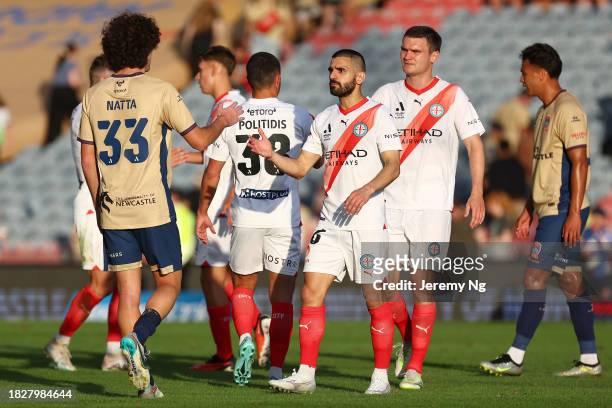 Players exchange pleasantries at full time after the A-League Men round six match between Newcastle Jets and Melbourne City at McDonald Jones...