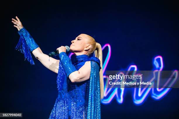 Mexican singer Yuri performs during a concert as part of the 'Euforia Tour' at Arena Monterrey on December 2, 2023 in Monterrey, Mexico.