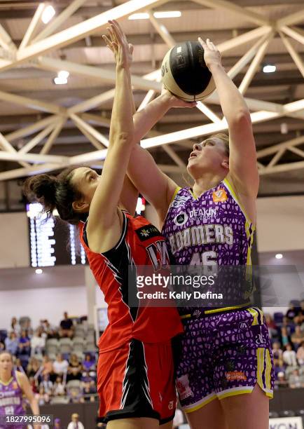Sara Blicavs of the Boomers drives to the basket during the WNBL match between Melbourne Boomers and Perth Lynx at Melbourne Sports Centres -...