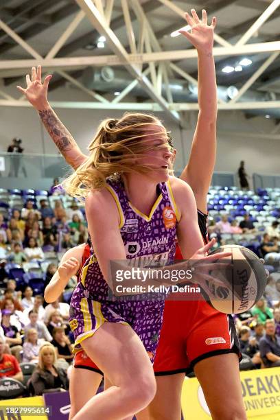 Keely Froling of the Boomers handles the ball during the WNBL match between Melbourne Boomers and Perth Lynx at Melbourne Sports Centres - Parkville,...