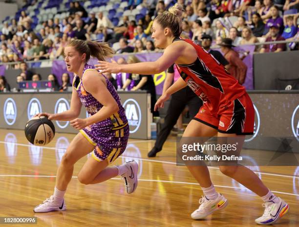 Aimie Rocci of the Boomers handles the ball during the WNBL match between Melbourne Boomers and Perth Lynx at Melbourne Sports Centres - Parkville,...