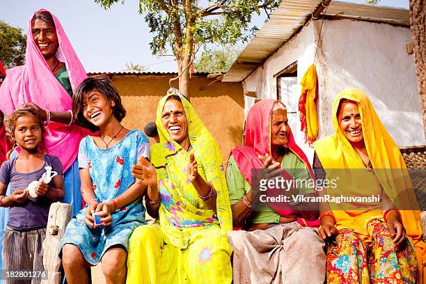 cheerful traditional rural indian family of rajasthan - village stock pictures, royalty-free photos & images