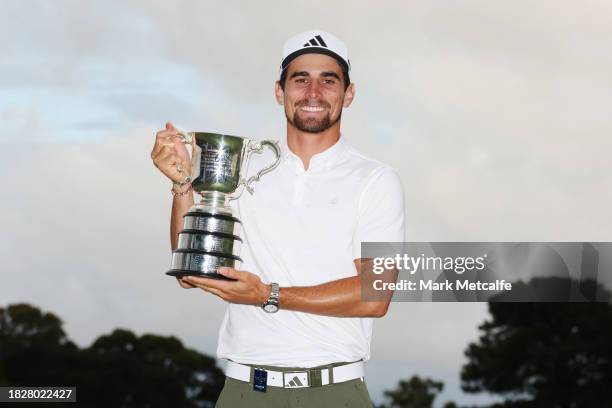 Joaquin Niemann of Chile poses with the Stonehaven Cup after winning the Men's ISPS HANDA Australian Open on the 18th green following the ISPS HANDA...