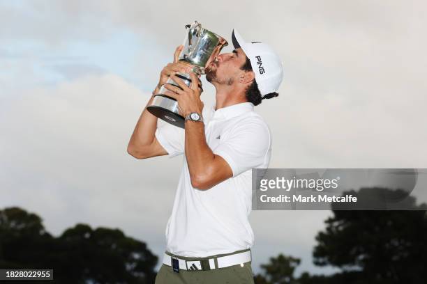 Joaquin Niemann of Chile kisses the Stonehaven Cup after winning the Men's ISPS HANDA Australian Open on the 18th green following the ISPS HANDA...