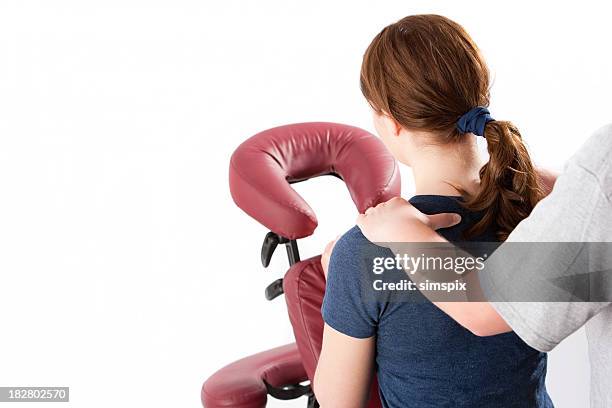 onsite massage - moving up to seated position stock pictures, royalty-free photos & images