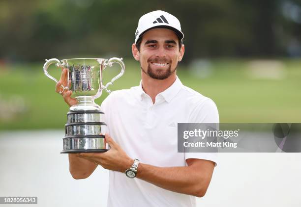 Joaquin Niemann of Chile poses with the Stonehaven Cup after winning the Men's ISPS HANDA Australian Open on the 18th green following the ISPS HANDA...