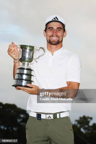 Joaquin Niemann of Chile poses with the Stonehaven Cup after winning the Men's ISPS HANDA Australian Open on the 18th green following the ISPS HANDA...