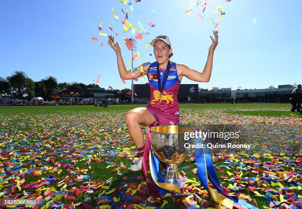 Sophie Conway of the Lions celebrates with the premiership Cup during the AFLW Grand Final match between North Melbourne Tasmania Kangaroos and...