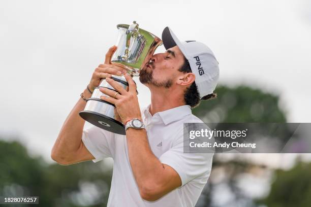 Joaquin Niemann of Chile poses with the Stonehaven Cup after winning the Men's ISPS HANDA Australian Open on the 18th green following the ISPS HANDA...