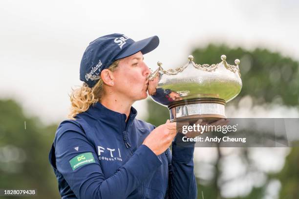 Ashleigh Buhai of South Africa kisses the Patricia Bridges Bowl after winning the Women's ISPS HANDA Australian Open for a back to back time on the...