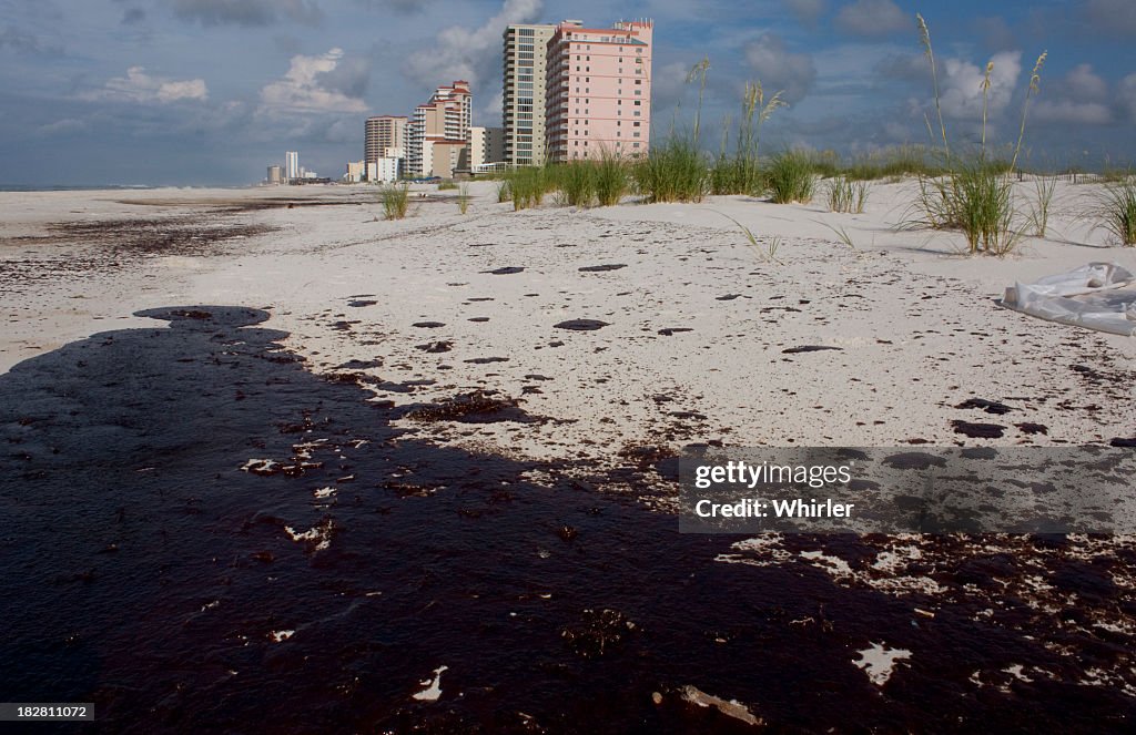 Oil on beach sand from oil spill