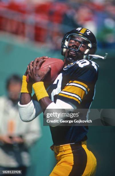 Wide receiver John Stallworth of the Pittsburgh Steelers catches a pass as he warms up before a game against the Cincinnati Bengals at Three Rivers...