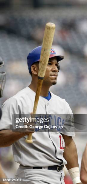 Moises Alou of the Chicago Cubs bats against the Pittsburgh Pirates during a game at PNC Park on September 21, 2003 in Pittsburgh, Pennsylvania. The...