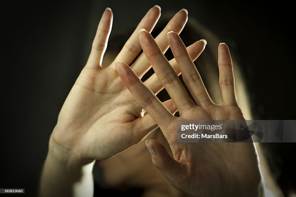 Woman defending herself from attack