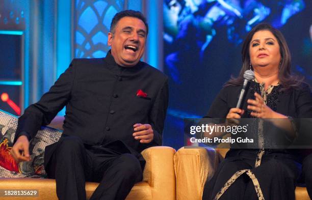 Boman Irani and Farah Khan attend the music launch of movie 'Happy New Year' on September 15, 2014 in Mumbai, India