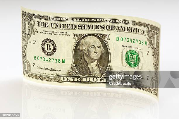 ondulato banconota da un dollaro con riflessione - banconota da 1 dollaro statunitense foto e immagini stock