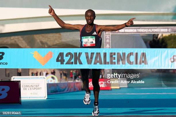Sisay Lemma of Kenya arrives to the finish line for win the 2023 Valencia Marathon Trinidad Alfonso on December 03, 2023 in Valencia, Spain.