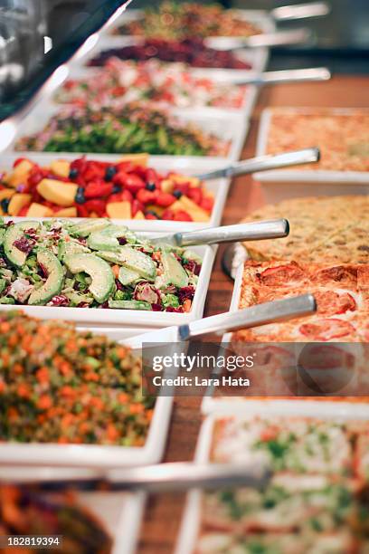 close-up of choices at a gourmet salad bar - salad bar stock pictures, royalty-free photos & images