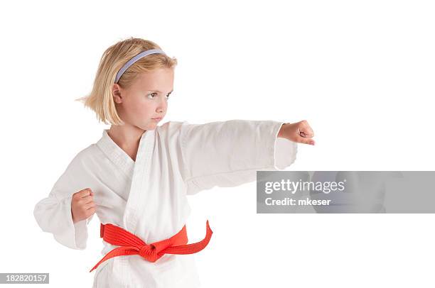 punching girl. - girl martial arts stock pictures, royalty-free photos & images