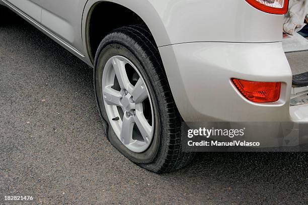 flat tire - flat tyre stock pictures, royalty-free photos & images