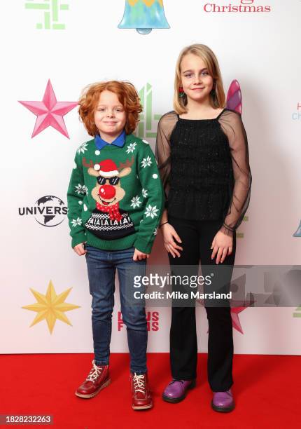 Teddy Skelton and Amelie Law attend the premiere of Channel 4's "Mog's Christmas" at the Odeon Luxe Leicester Square on December 03, 2023 in London,...