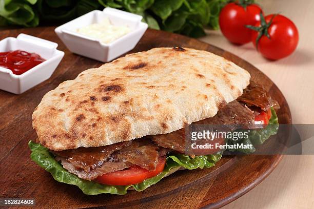 give kebab sandwich - kebab stock pictures, royalty-free photos & images