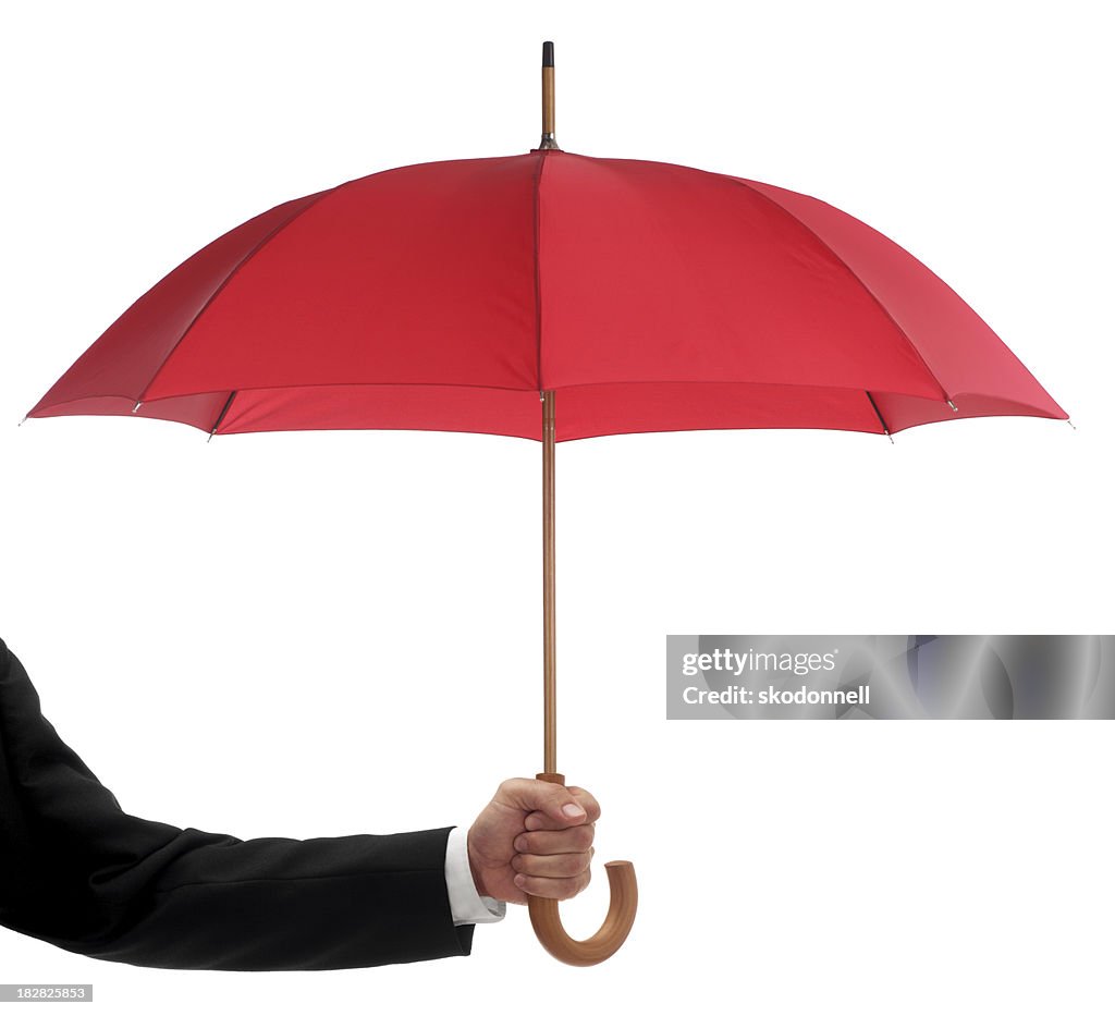 Businessman Holding a Red Umbrella