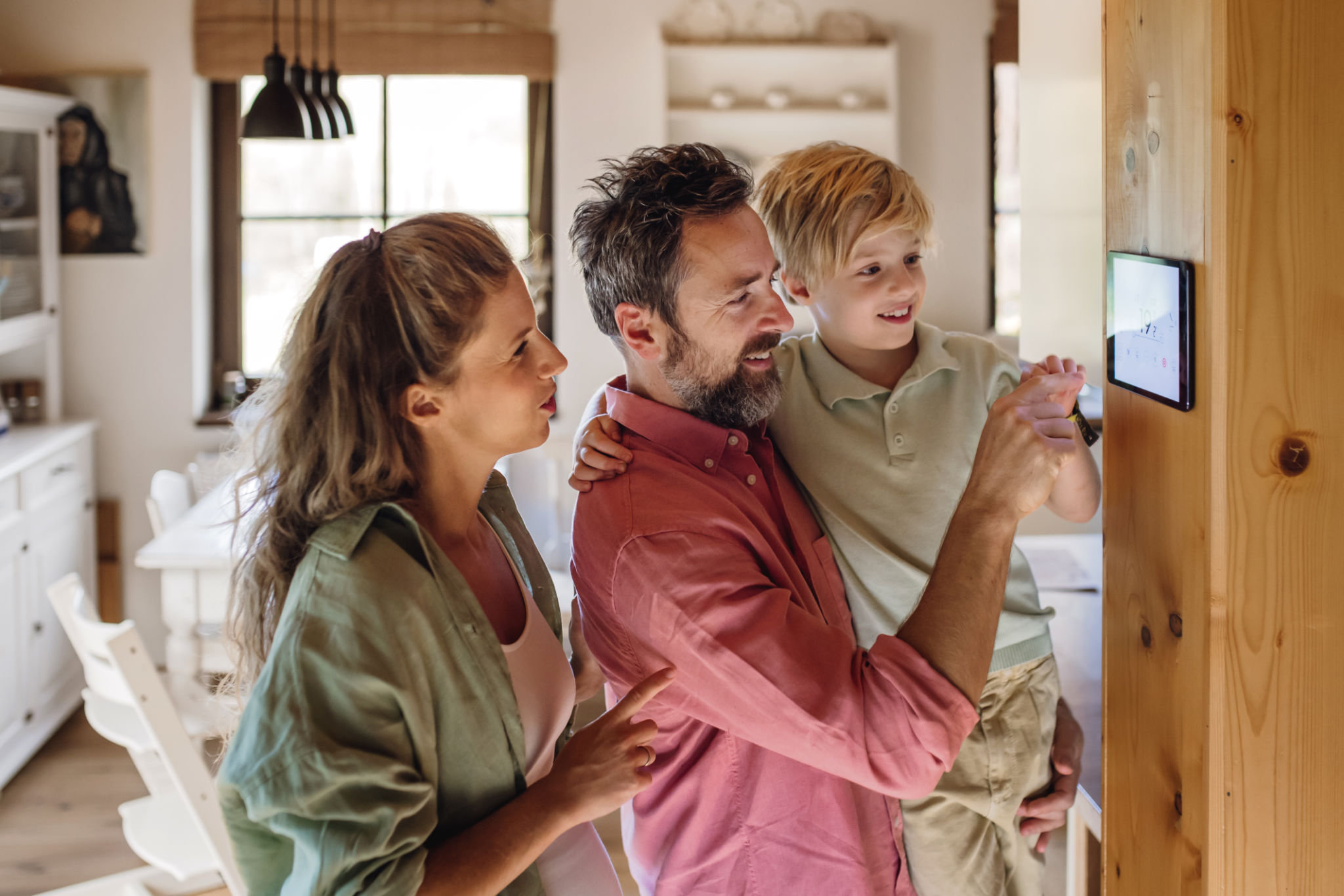 family using thermostat