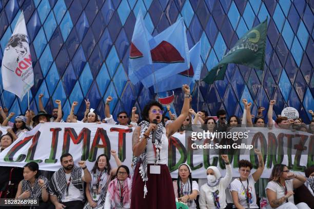 Activists demand a ceasefire in the Gaza conflict on day four of the UNFCCC COP28 Climate Conference on December 03, 2023 in Dubai, United Arab...