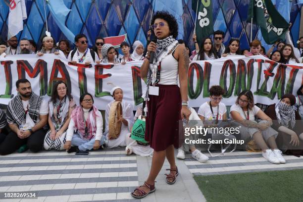 Activists protest for a ceasefire in the Gaza conflict on day four of the UNFCCC COP28 Climate Conference on December 03, 2023 in Dubai, United Arab...