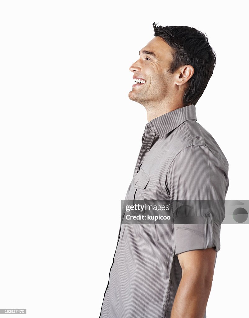 Profile of a smiling mid adult man against white