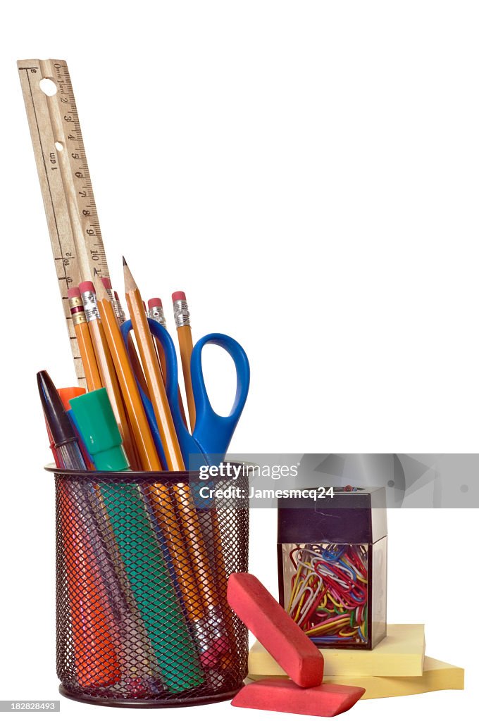 Various school supplies isolated on a white background