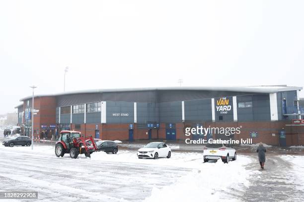 General view outside the stadium showing a tractor clearing snow prior to the Emirates FA Cup Second Round match between Chesterfield and Leyton...