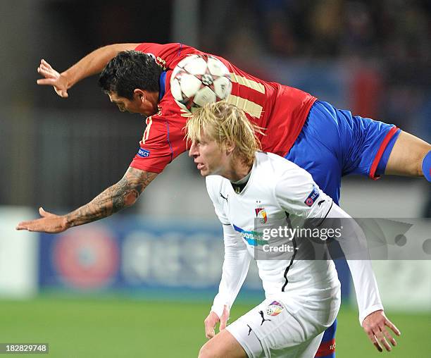 Viktoria Plzen's Frantisek Rajtoral vies with PFC CSKA Moscow's Mark Gonzalez during their UEFA Champions League group D match in Saint-Petersburg on...