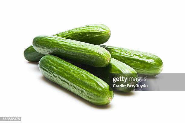 cucumbers - komkommer stockfoto's en -beelden