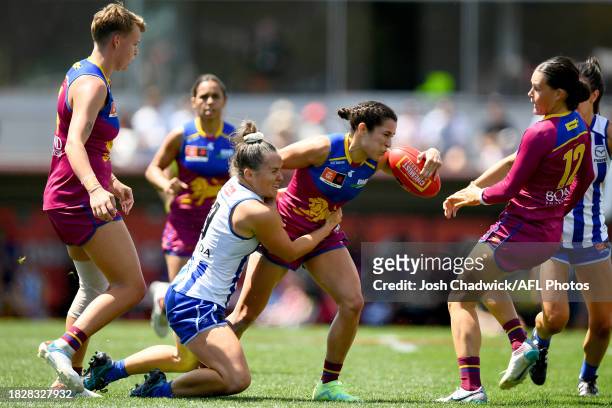 Ally Anderson of the Lions is tackled by Emma Kearney of the Kangaroos during the AFLW Grand Final match between North Melbourne Tasmania Kangaroos...