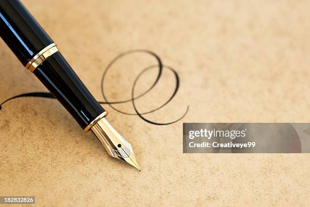 fountain pen & flourish - fountain pen stock pictures, royalty-free photos & images