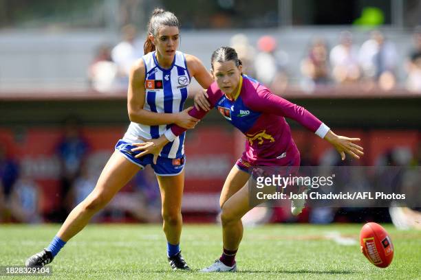 Erika O'Shea of the Kangaroos and Sophie Conway of the Lions compete for the ball during the AFLW Grand Final match between North Melbourne Tasmania...